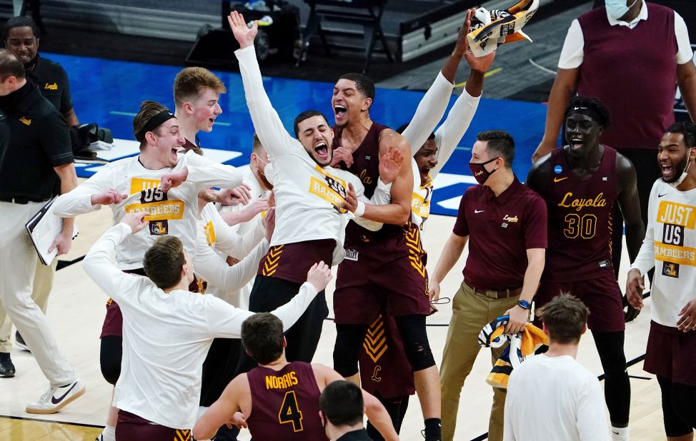 The Loyola Ramblers celebrate a berth in the Sweet Sixteen. Loyola, an 8-seed in the Midwest Region, had just defeated Illinois, the region's No. 1 seed.