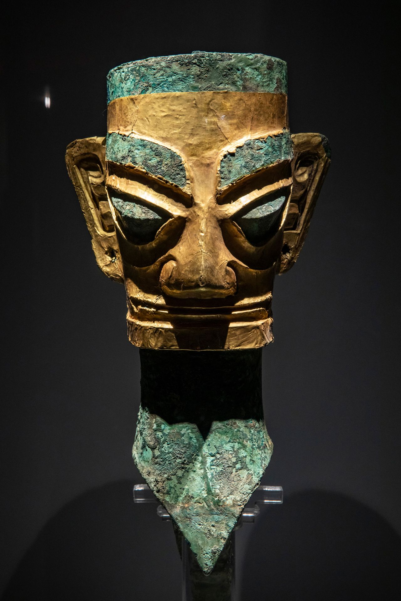 A bronze head and mask uncovered from Sanxingdui in 1986, when the first sacrificial pits were found at the site.