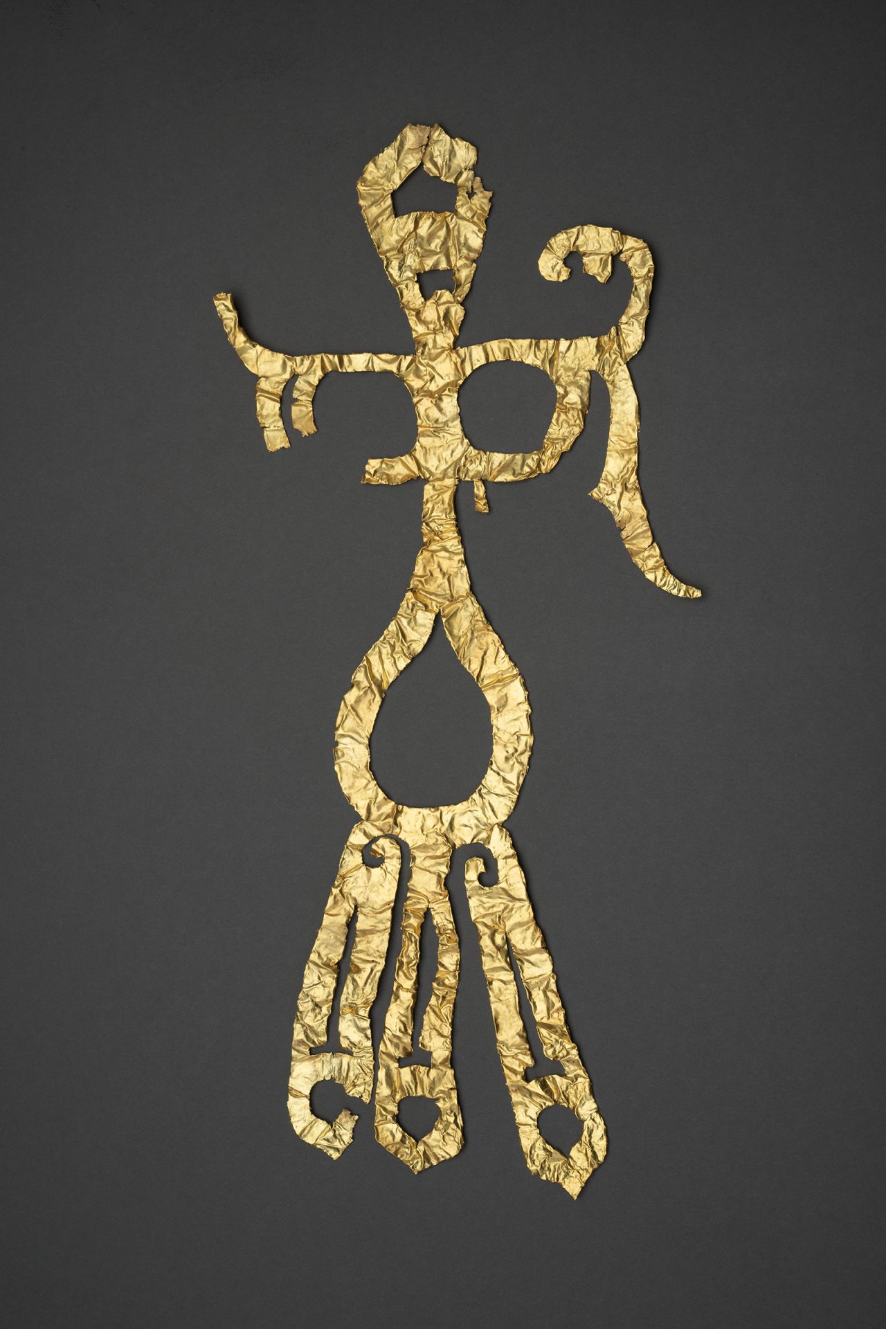 A gold decoration was among more than 500 other items recently unearthed from the site.