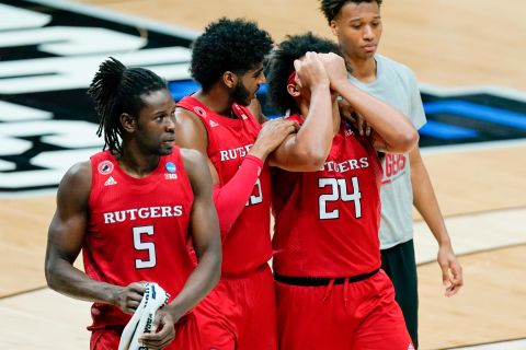 Rutgers' Myles Johnson consoles Ron Harper Jr. after the close loss to Houston.