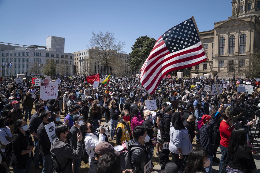 Demonstrators gather at Liberty Plaza during an anti-Asian hate rally outside the Georgia Capitol in Atlanta on Saturday, March 20.