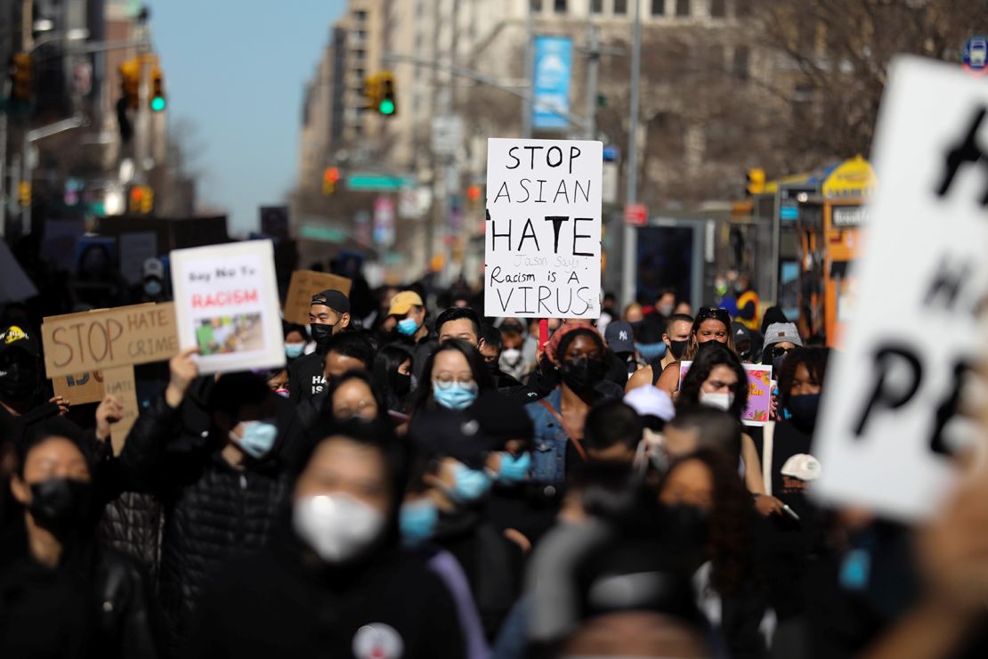 People march during a protest against Asian hate in New York on Sunday, March 21.