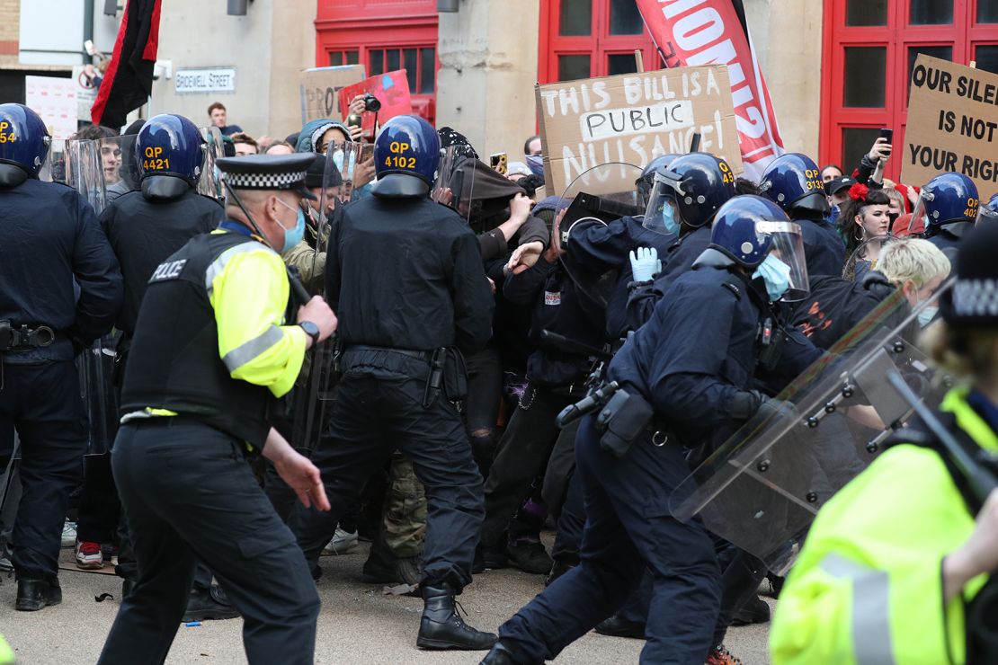 Protesters and police clash during the event.