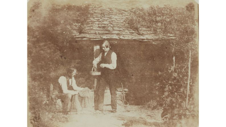 An image by early photographer William Henry Fox Talbot shows his valet and assistant, Nicolaas Henneman (left), sitting next to an unidentified man holding a basket. Scroll through the gallery to see more of Talbot's images.