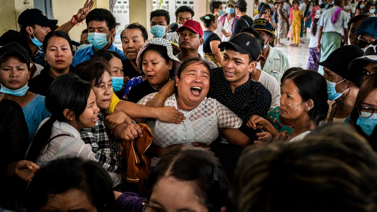 The mother of Aung Kaung Htet wails during the teenage boy's funeral on March 21. Aung, 15, was killed when military junta forces opened fire on anti-coup protesters in Yangon.