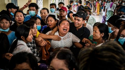 The mother of Aung Kaung Htet wails during the teenage boy's funeral on March 21. Aung, 15, was killed when military junta forces opened fire on anti-coup protesters in Yangon.