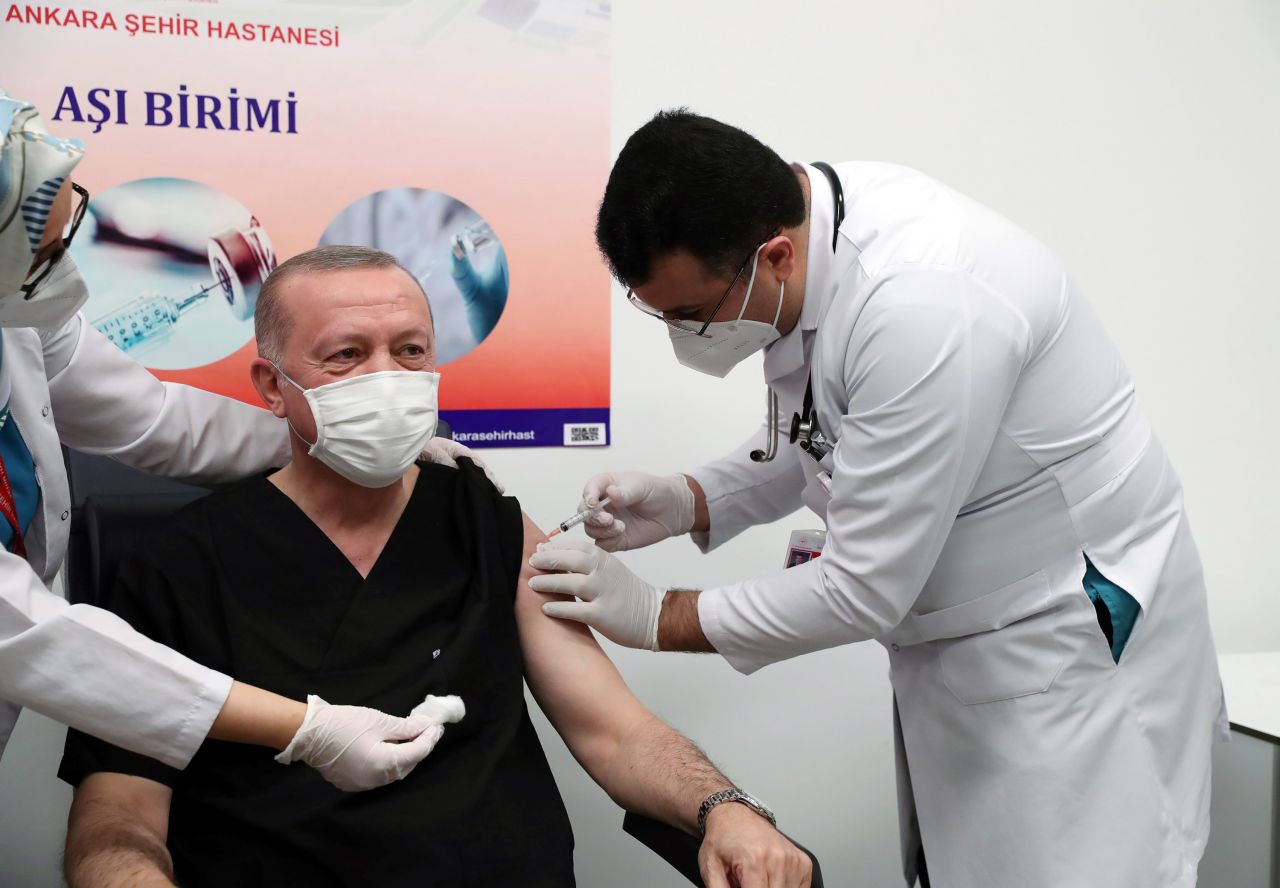 Turkish President Recep Tayyip Erdogan receives his first dose on January 14.