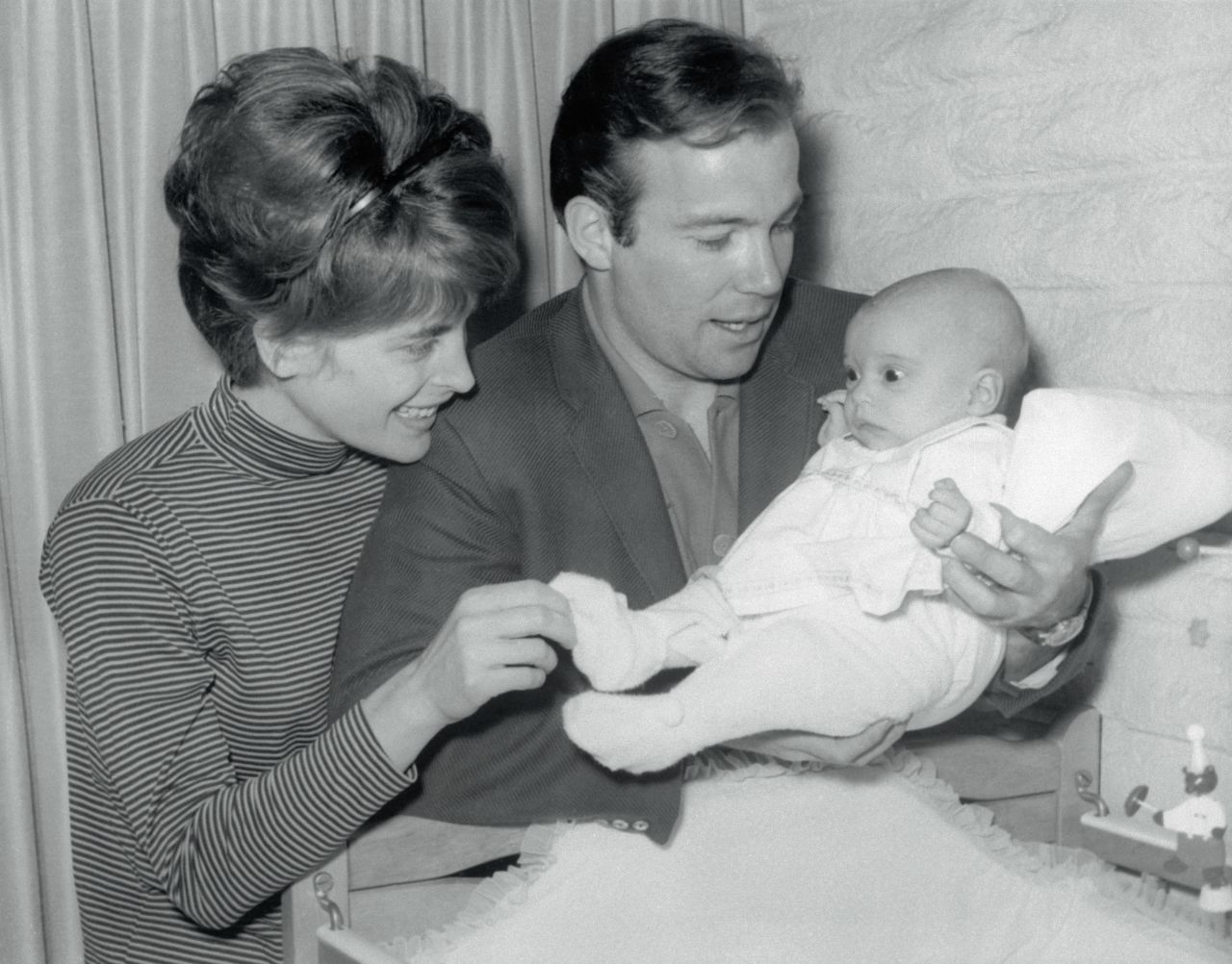Shatner says goodbye to his baby daughter, Melanie, before leaving on a trip in 1965. Shatner and Gloria Rand had three daughters together before divorcing in 1969.