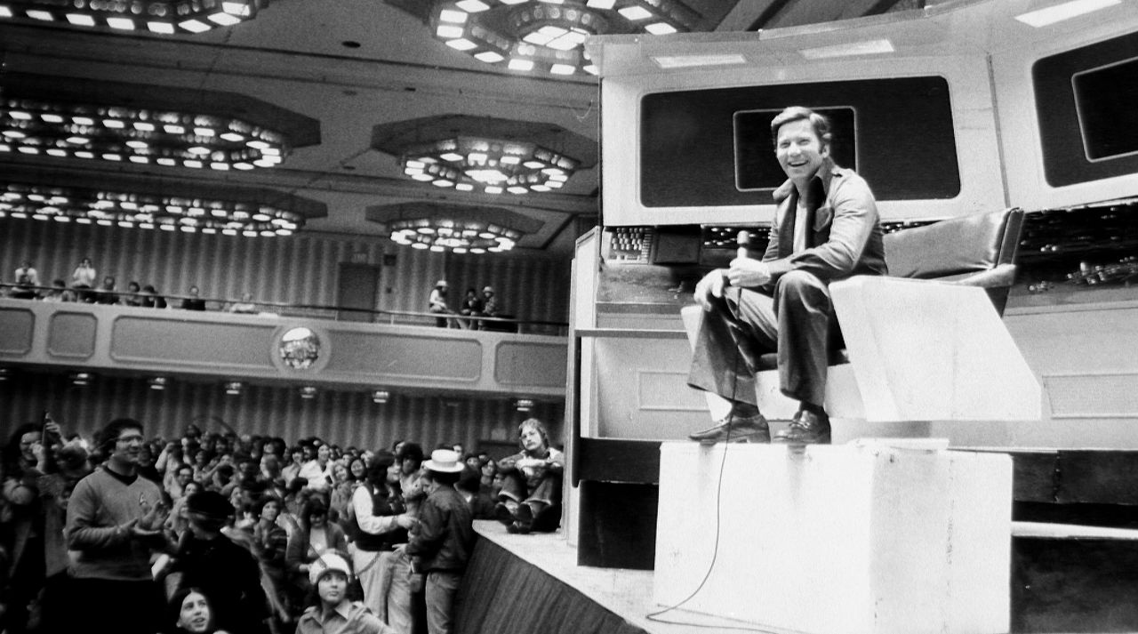 Shatner talks to fans at a "Star Trek" convention in 1976.