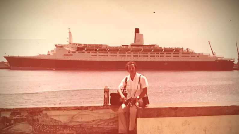 <strong>Ship photographer:</strong> Robert had previously worked on the QE2 cruise ship, pictured here. Whatever the ship he was working on, his job was to wander the vessel, taking photos of passengers.
