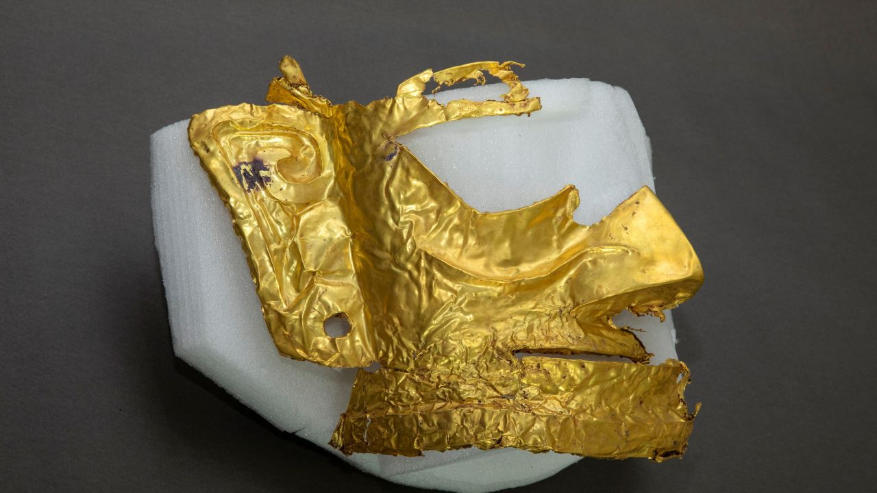 CHENGDU  -- Photo taken on March 17, 2021 shows a broken gold mask unearthed from a sacrificial pit at the Sanxingdui Ruins site in southwest China's Sichuan Province.
  Chinese archaeologists announced Saturday that some new major discoveries have been made at the legendary Sanxingdui Ruins site in southwest China, helping shed light on the cultural origins of the Chinese nation.
  Archaeologists have found six new sacrificial pits and unearthed more than 500 items dating back about 3,000 years at the Sanxingdui Ruins in Sichuan Province, the National Cultural Heritage Administration announced in the provincial capital Chengdu. (Photo by Shen Bohan/Xinhua via Getty) (Xinhua/Shen Bohan via Getty Images)