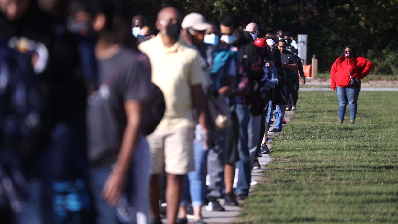 People line up to vote at the Gwinnett County Fairgrounds on October 30, 2020, in Lawrenceville, Georgia.