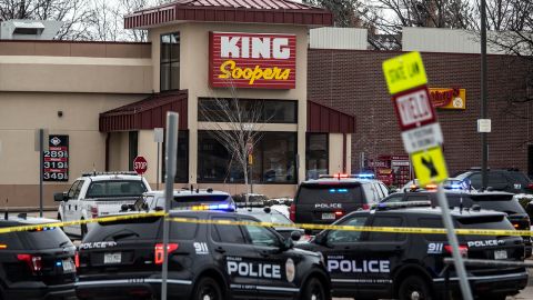 Police respond to the King Soopers grocery store in Boulder after a gunman opened fire Monday.