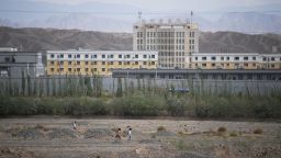 This photo taken on June 2, 2019 shows buildings at the Artux City Vocational Skills Education Training Service Center, believed to be a re-education camp where mostly Muslim ethnic minorities are detained, north of Kashgar in China's northwestern Xinjiang region. - As many as one million ethnic Uighurs and other mostly Muslim minorities are believed to be held in a network of internment camps in Xinjiang, but China has not given any figures and describes the facilities as Òvocational education centresÓ aimed at steering people away from extremism. (Photo by GREG BAKER / AFP) / TO GO WITH China-Xinjiang-media-rights-press,FOCUS by Eva XIAO        (Photo credit should read GREG BAKER/AFP via Getty Images)