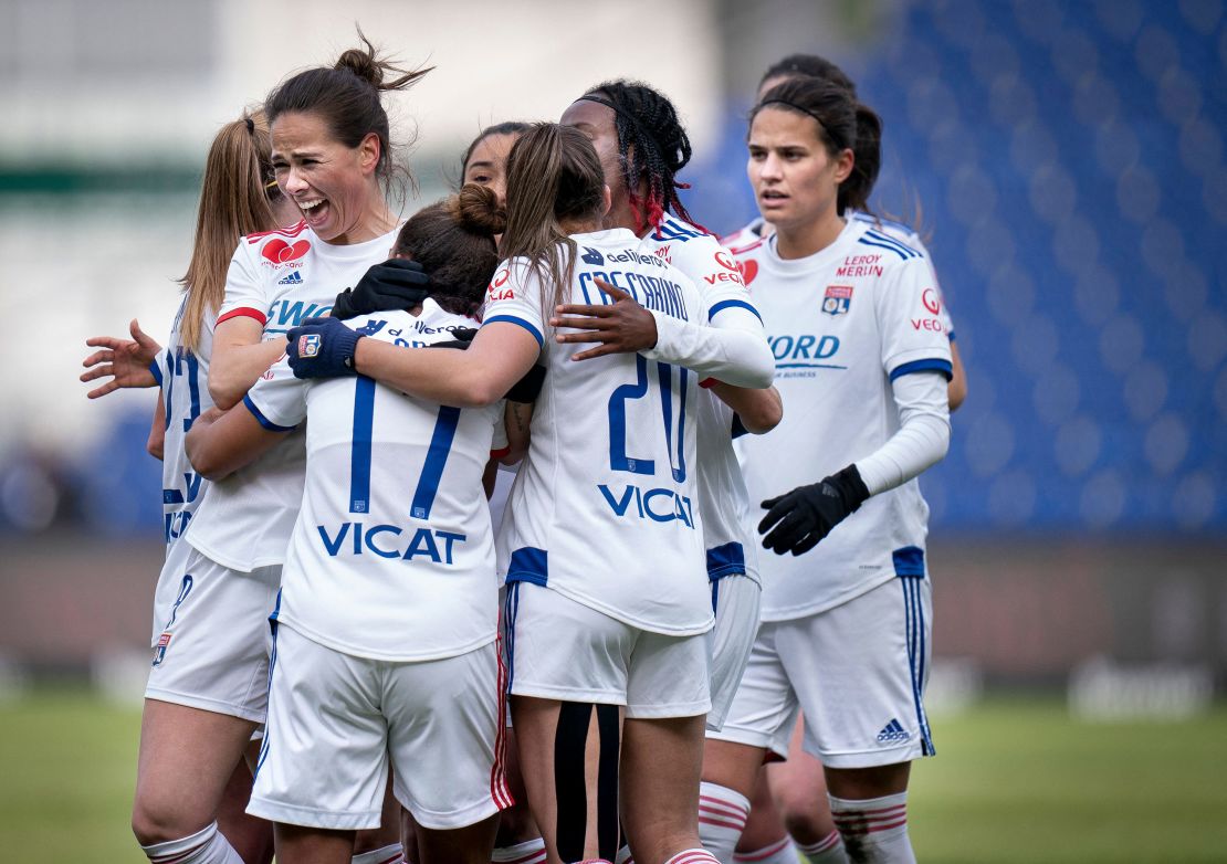 Lyon players celebrate scoring against Broendby IF in the Women's Champions League. 