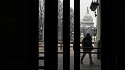 Pedestrians walk into Union Station, near the U.S. Capitol in Washington, D.C., U.S., on Sunday, Feb. 14, 2021. 