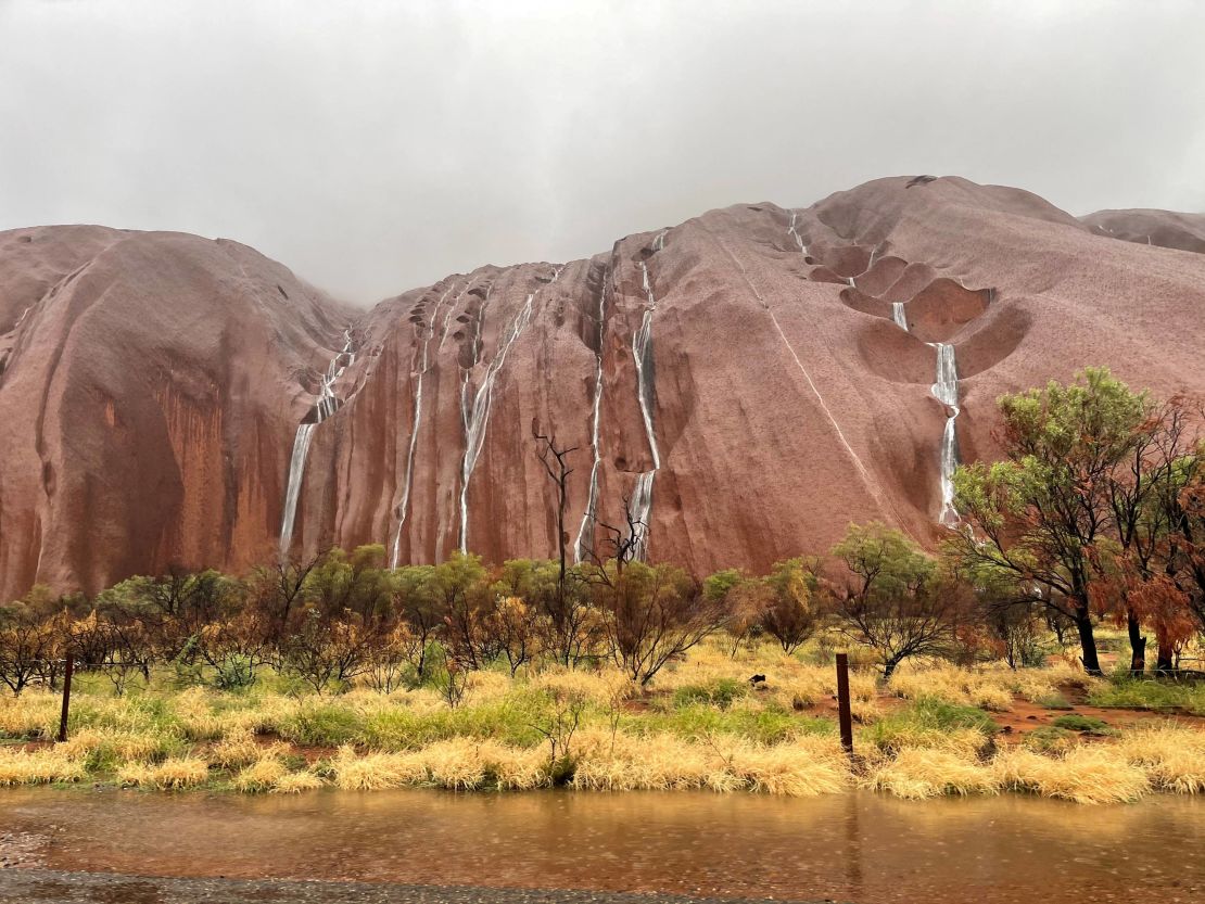 Multiple waterfalls tumble over the surface of Uluru, a UNESCO World Heritage site that saw rain totaling up to five times the March monthly average in just four days in some areas. 
