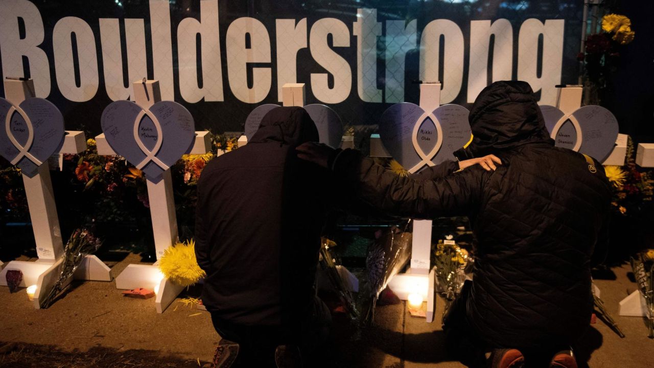 Mourners pay tribute to the 10 victims of the Boulder shooting.