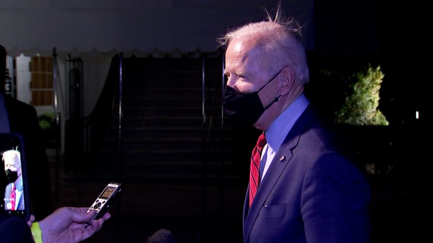 President Joe Biden laughs off a reporter's question about North Korea's first missile test since he came to office.