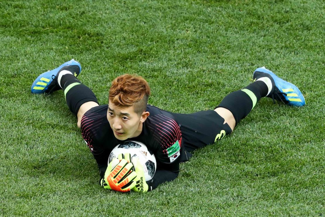 Jo Hyun-woo makes a save in the 2018 FIFA World Cup match against Sweden.