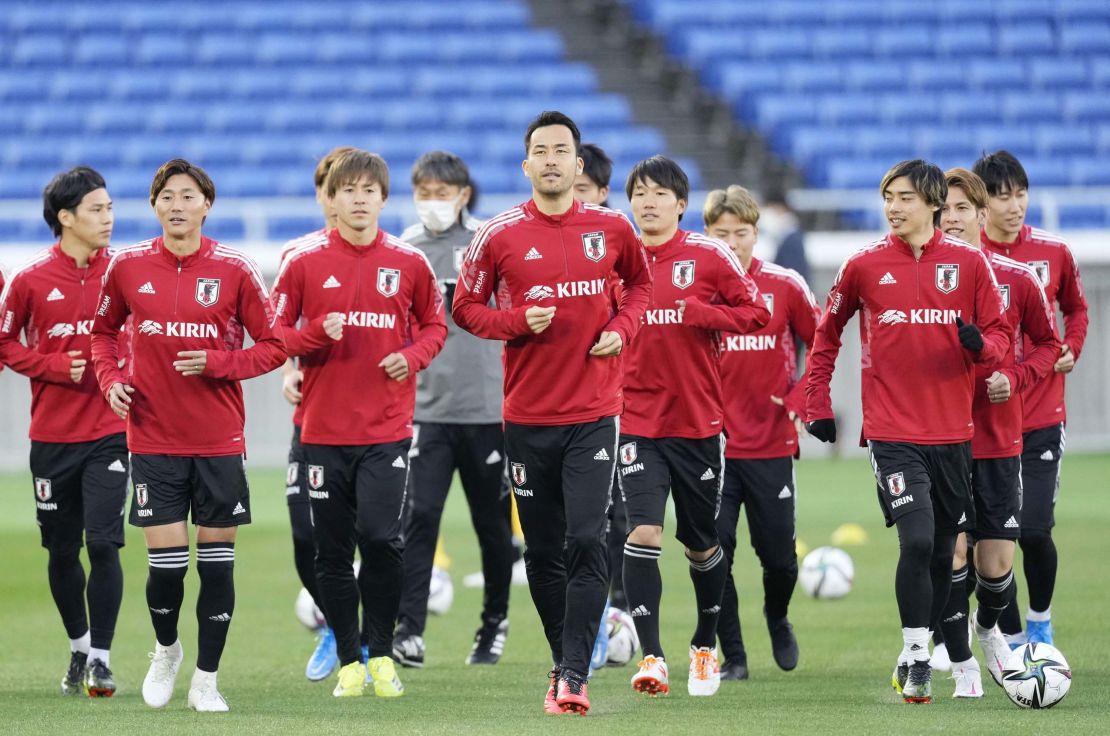 Members of Japan's national football team train in Yokohama.