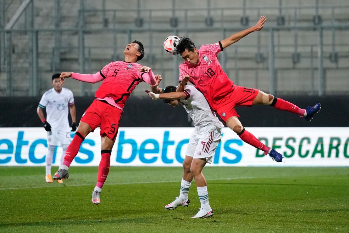 Woo-young Jung and Dujae Won clash with Raul Jimenez of Mexico.