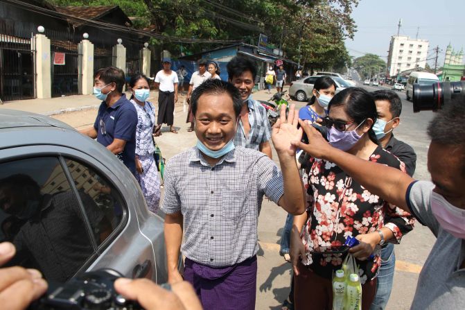 Thein Zaw, a journalist with the Associated Press, waves after being <a href="index.php?page=&url=https%3A%2F%2Fwww.cnn.com%2F2021%2F03%2F24%2Fmedia%2Fap-journalist-myanmar%2Findex.html" target="_blank">released from a prison</a> in Yangon on March 24. He had been detained while covering an anti-coup protest in February.