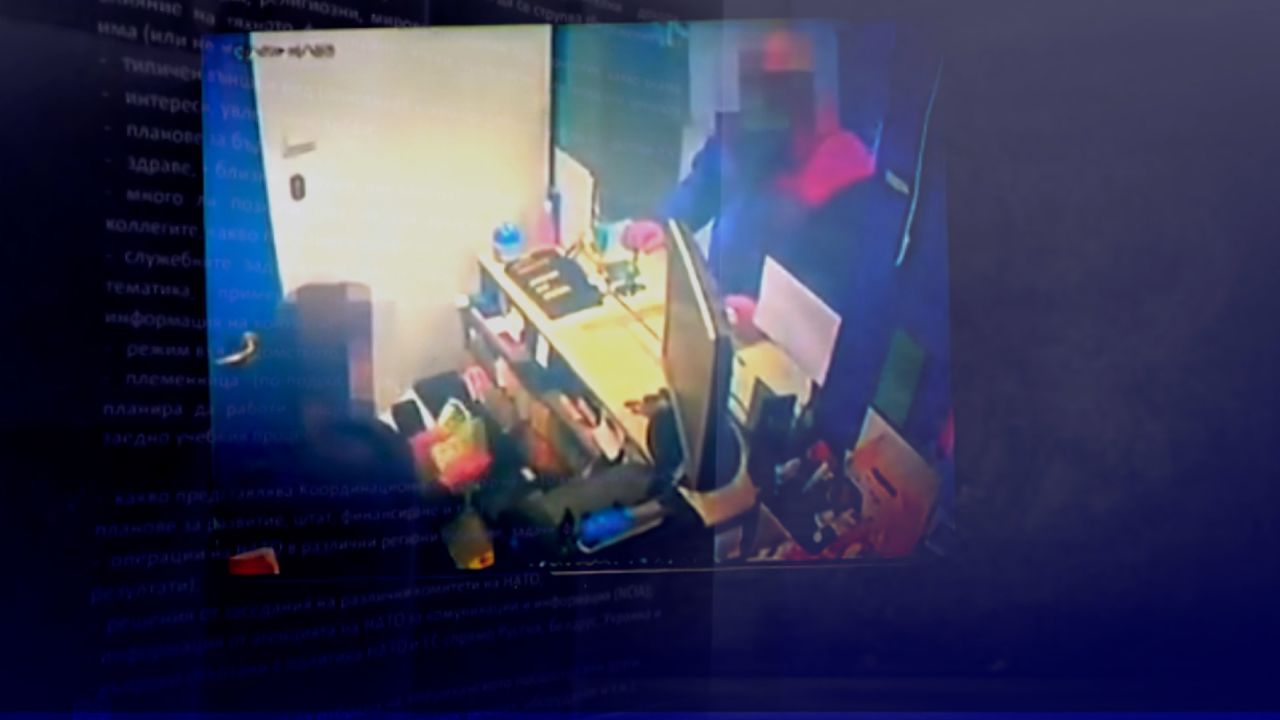 An operative is caught on camera appearing to swap cash for different currencies.