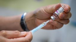 Vaccinators administer the Oxford AstraZeneca COVID-19 Vaccine at the medical centre on March 20, 2021 in Bridport, England.
