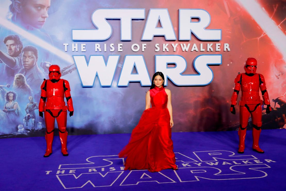 Kelly Marie Tran poses with 'Star Wars' stormtroopers on the red carpet in London on December 18, 2019.