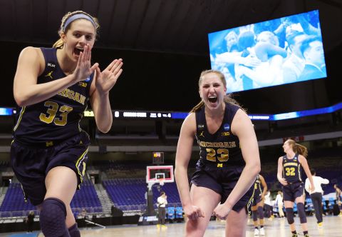 Michigan's Emily Kiser, left, and Danielle Rauch celebrate a second-round win over Tennessee.