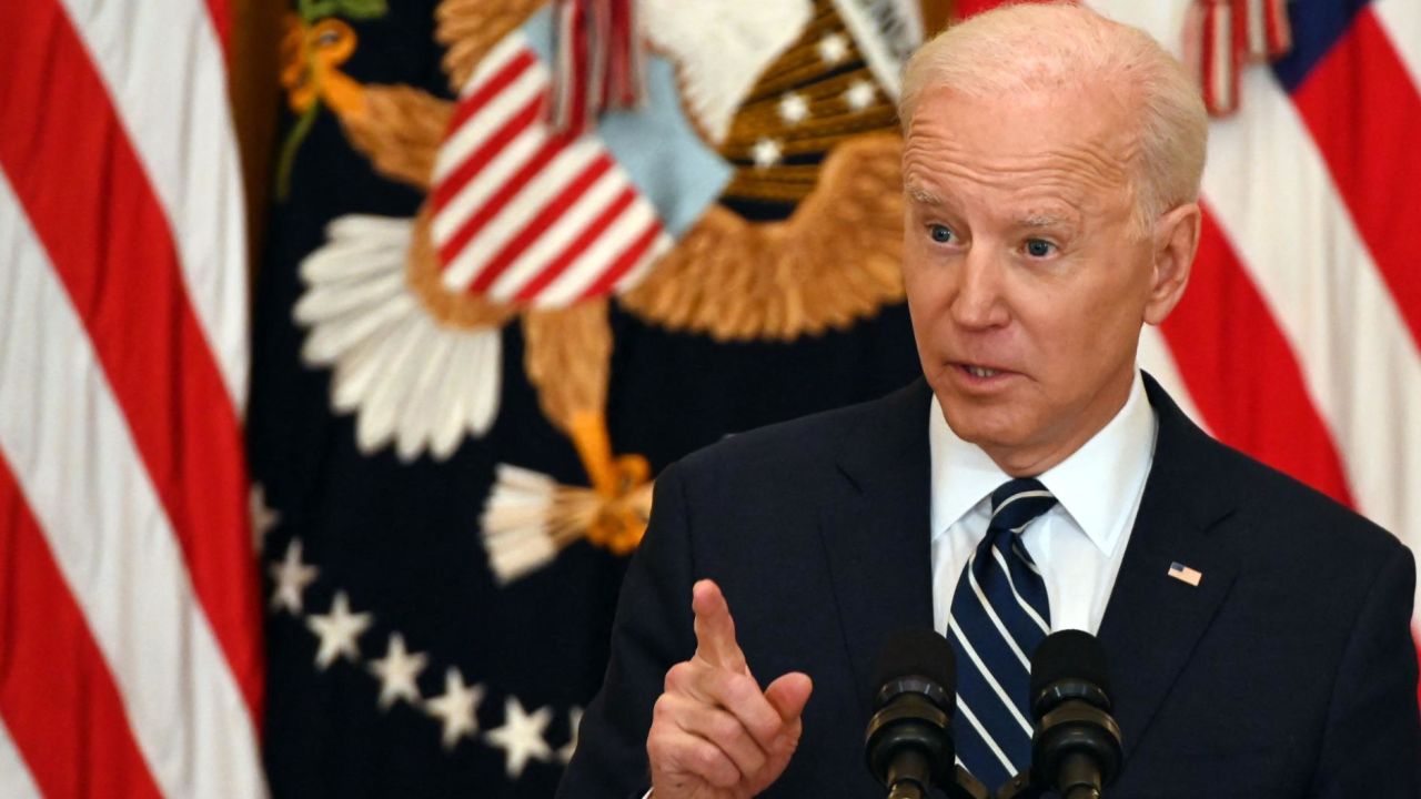 US President Joe Biden answers a question during his first press briefing in the East Room of the White House in Washington, DC, on March 25, 2021. (Photo by Jim WATSON / AFP) (Photo by JIM WATSON/AFP via Getty Images)