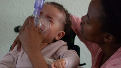 To calm Ayah down during breathing treatments, her mother softly sings "You Are My Sunshine."