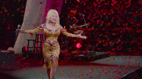 The legendary singer is shown in a scene from "Dolly Parton: A MusicCares Tribute" on Netflix.