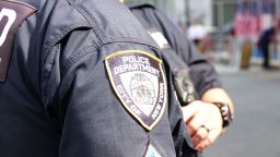 11 September 2019, US, New York: The New York City Police Department (NYPD) logo can be seen on a uniform during the 18th anniversary of the September 11, 2001 terrorist attacks near Ground Zero. Photo: Alexandra Schuler/dpa (Photo by Alexandra Schuler/picture alliance via Getty Images)
