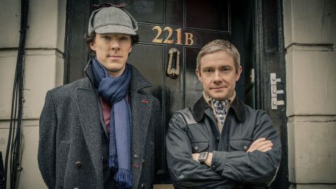 Benedict Cumberbatch (in the hat) and Martin Freeman at the Baker Street HQ.
