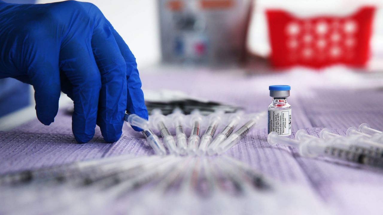 Doses of the Johnson & Johnson Covid-19 vaccine are prepared at a clinic targeting immigrant community members in Los Angeles March 25.