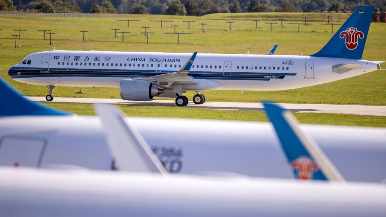 An Airbus A320 aircraft built for the airline China Southern being towed to a parking position at Rostock-Laage airport.