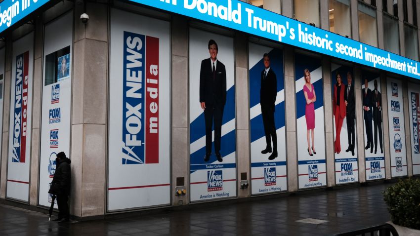 NEW YORK, NY - FEBRUARY 09: News headlines on the impeachment trial of Donald Trump are displayed outside of the Fox headquarters on February 09, 2021 in New York City. After listening to nearly four hours of legal arguments, the Senate has voted on Tuesday to move ahead with the impeachment trial of former President Trump. (Photo by Spencer Platt/Getty Images)