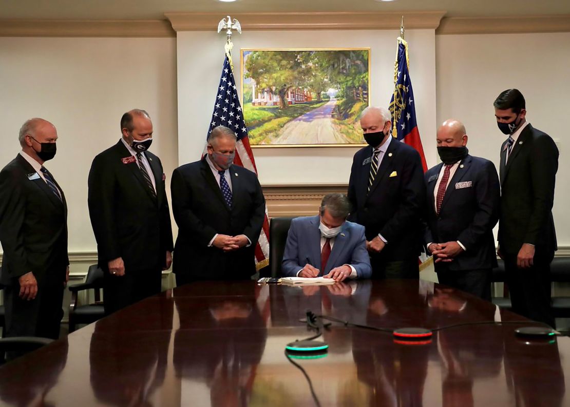 Gov. Brian Kemp signs Georgia's Election Integrity Act on March 25, 2021.