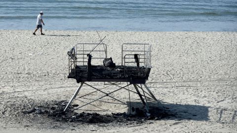 The rainbow lifeguard tower in Long Beach, California, burned overnight on Tuesday, March 23. 