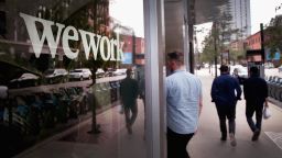 CHICAGO, ILLINOIS - AUGUST 14:  A sign marks the location of a WeWork office facility on August 14, 2019 in Chicago, Illinois. WeWork, a real estate firm that leases shared office space, announced today that it had filed a financial prospectus with regulators to become a publicly traded company. (Photo by Scott Olson/Getty Images)