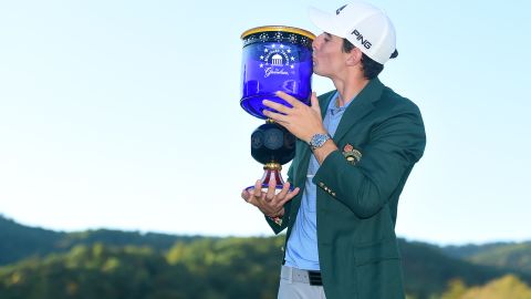 Niemann poses with the trophy after winning the Greenbrier Classic.