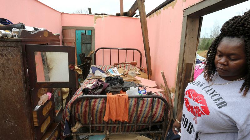 NextImg:In pictures: Deadly tornadoes tear through the South | CNN