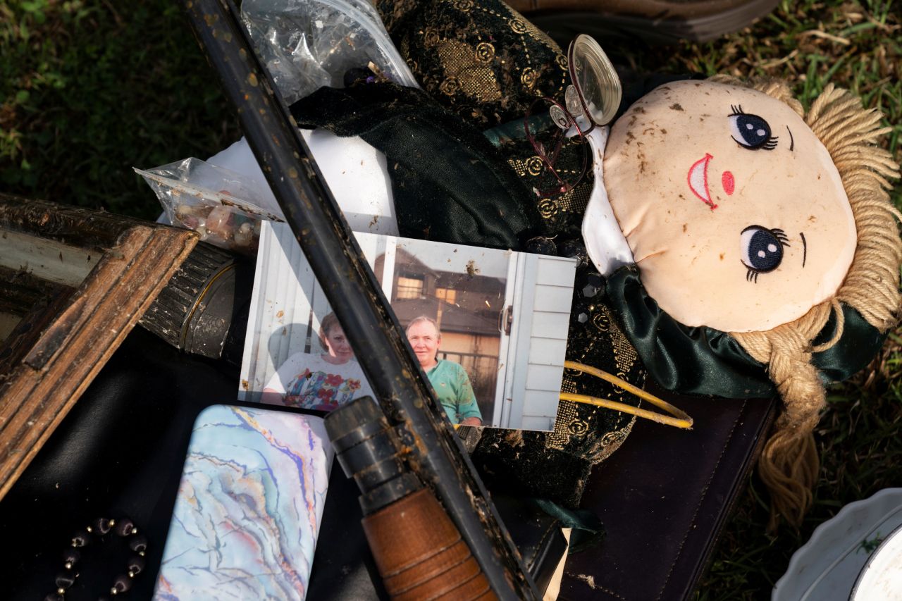 A photo is seen on a pile of items salvaged from a home in Ohatchee.