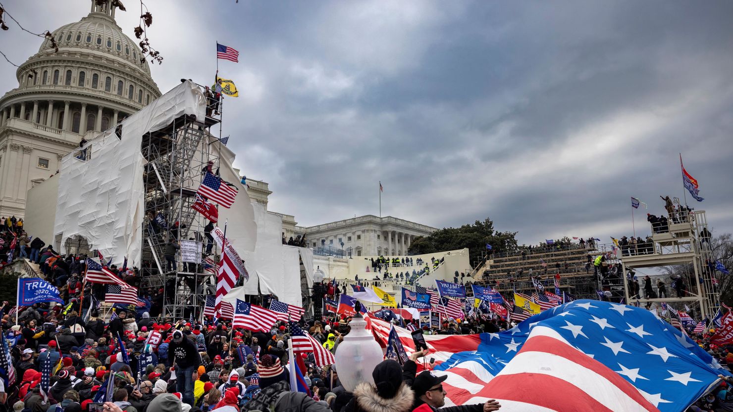 Trump supporters clash with police and security forces as people try to storm the US Capitol on January 6, 2021, in Washington. 