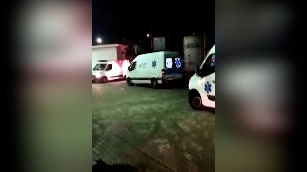 Ambulances loaded with patients wait outside of a hospital in Brazil to unload their passengers.