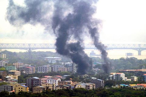 Smoke rises over Yangon's Thaketa Township on March 27.