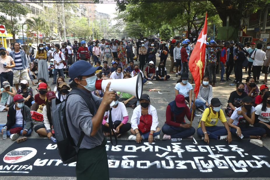 Protesters occupy a street during a rally in Yangon on March 27.