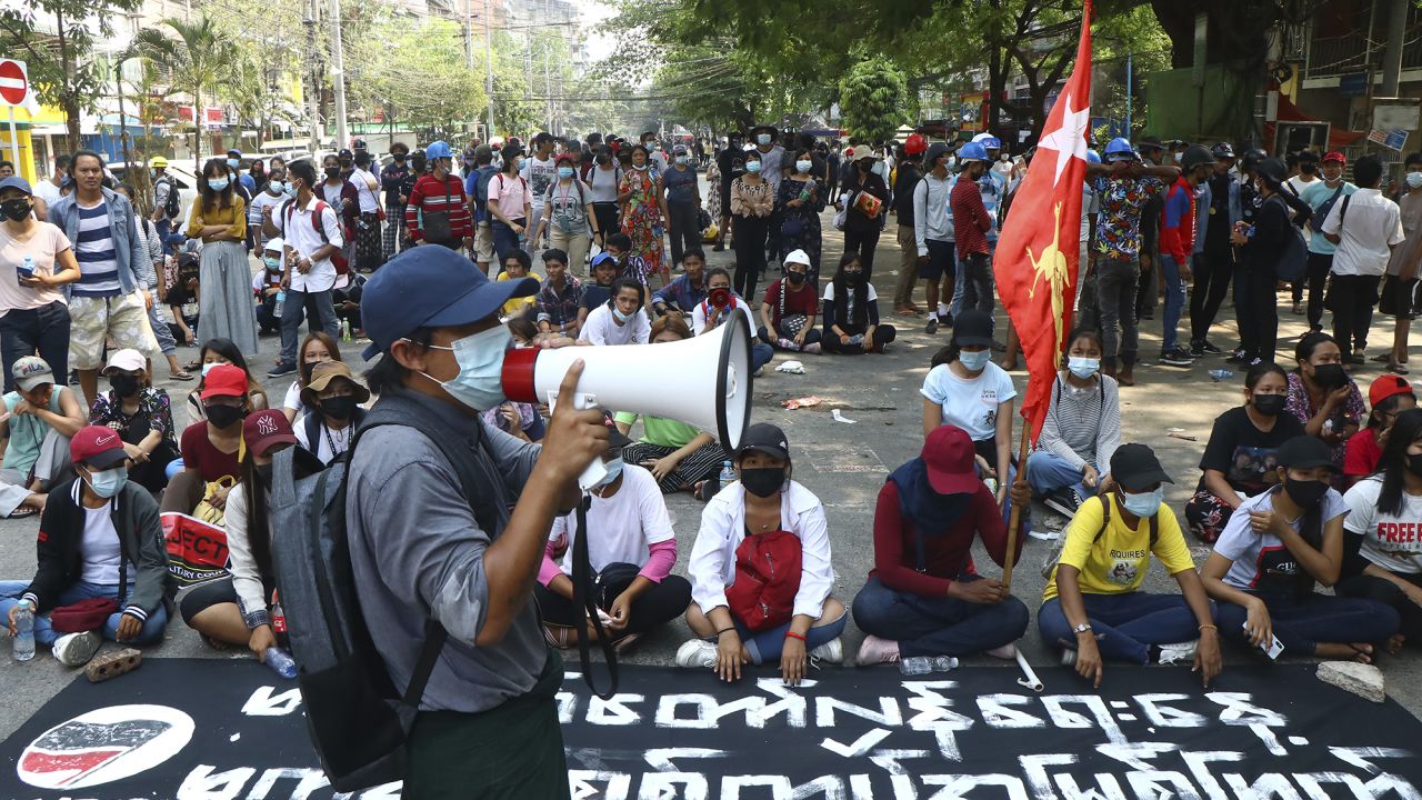 Protesters occupy a street during a rally against the military coup on Saturday in Tarmwe township in Yangon, Myanmar.